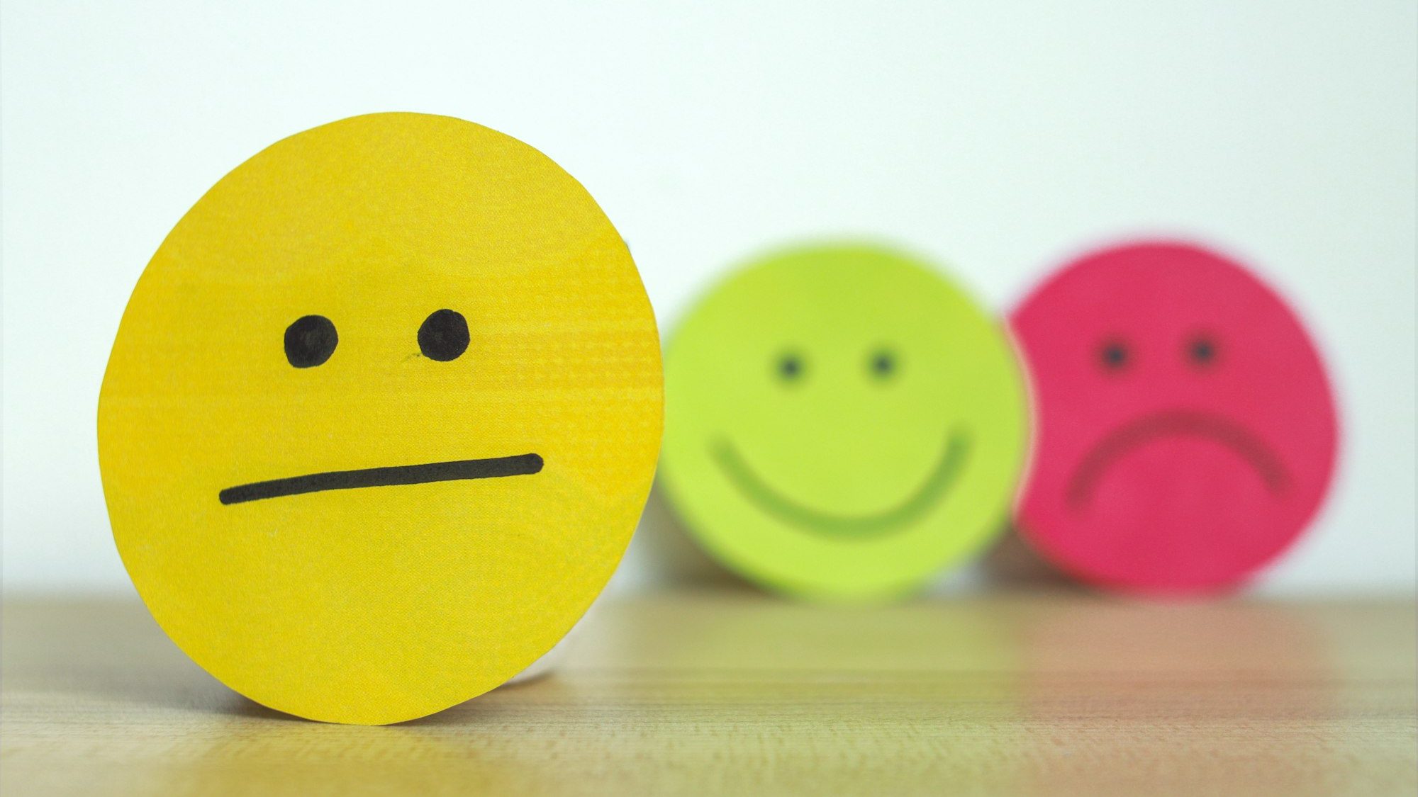 Selective Focus to Flat Face Emoji Satisfaction Review